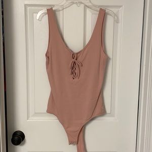 Pink bodysuit